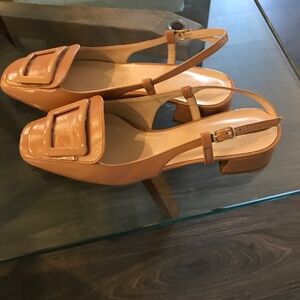 Beige patent leather slingbacks